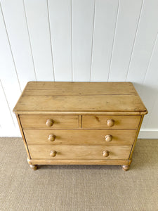 An Antique English Pine Chest of Drawers or Dresser with Tulip Feet c1890