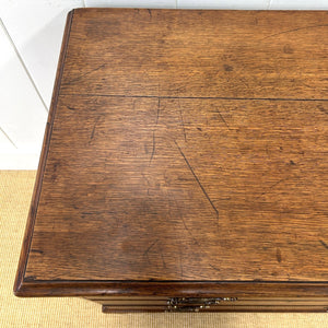 A English Georgian Chest of Drawers with Swan Neck Hardware