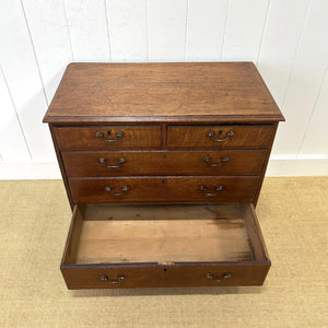 A English Georgian Chest of Drawers with Swan Neck Hardware