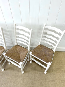 A Set of 4 Ladderback Rush Seat Chairs Painted White