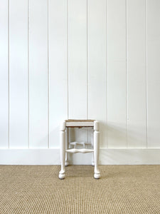 A Vintage English Wooden Stool with Rush Seat