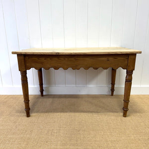 An Antique English Country Pine 4.5 ft Kitchen Dining Table with Scalloped Apron c1890