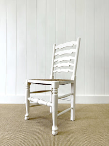 A Set of 4 Ladderback Rush Seat Chairs Painted White