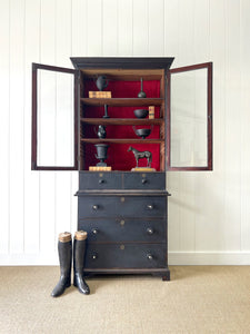 An Early 19th Century Tall but Narrow Ebonized English Bookcase