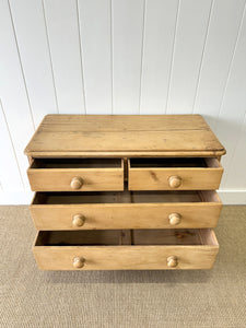 An Antique English Pine Chest of Drawers or Dresser with Tulip Feet c1890