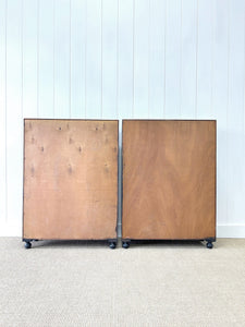 A Pair of English Teak Ebonized Bookcases