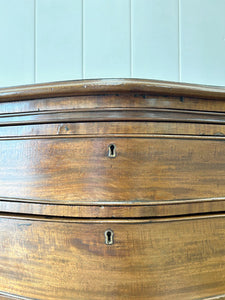 A Unique Serpentine Front Antique Mahogany Chest of Drawers