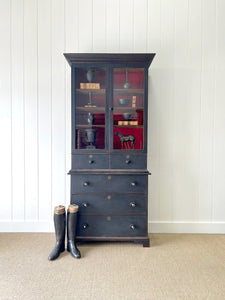 An Early 19th Century Tall but Narrow Ebonized English Bookcase