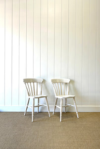 A Vintage Set of 4 White Slat Back Chairs