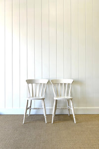 A Vintage Set of 4 White Slat Back Chairs