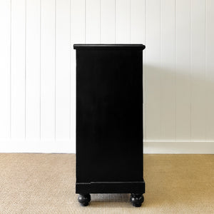 An Ebonized Antique English Chest of Drawers/Dresser