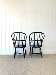 A Set of Four Black Windsor Armchairs