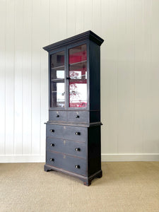 An Early 19th Century Tall but Narrow Ebonized English Bookcase