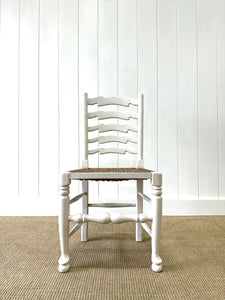 A Set of 4 Ladderback Rush Seat Chairs Painted White