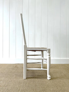 A Set of 4 Ladderback Rush Seat Chairs Painted White