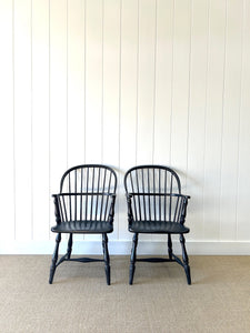 A Set of Four Black Windsor Armchairs