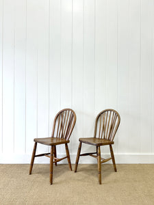 A Pair of Stick Back Elm Windsor Chairs with Natural Finish