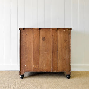 An Ebonized Antique English Chest of Drawers/Dresser