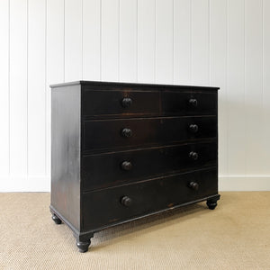 An Ebonized Antique English Chest of Drawers/Dresser