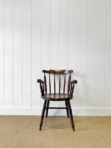 An Antique Penny-seat Stick Back Arm Chair