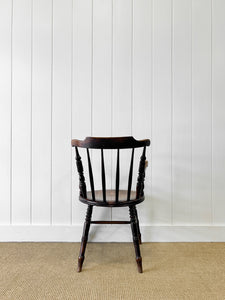 An Antique Penny-seat Stick Back Arm Chair