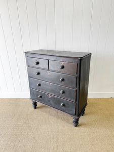 An Ebonized Antique English Chest of Drawers/Dresser