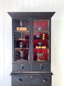 An Early 19th Century Tall but Narrow Ebonized English Bookcase