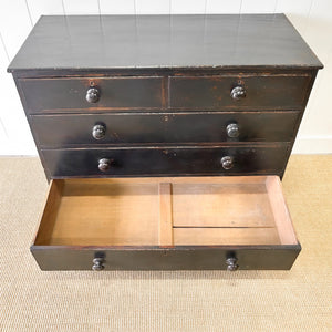 An Ebonized Antique English Chest of Drawers/Dresser