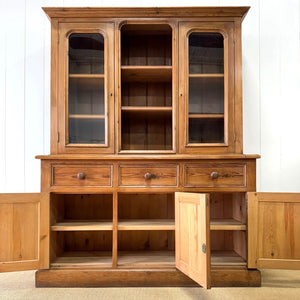 A 19th Century English Pine Bookcase Cabinet or Hutch with Arched Doors