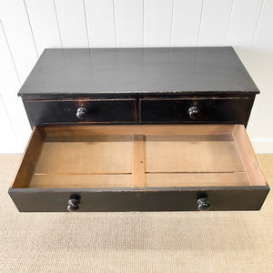 An Ebonized Antique English Chest of Drawers/Dresser