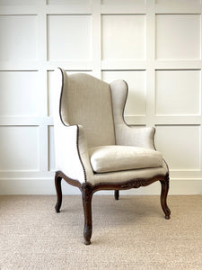 An Antique French Arm Chair with New Kravet Linen Upholstery