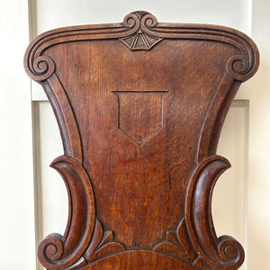 A Pair of Scottish William IV Oak Carved Hall Chairs