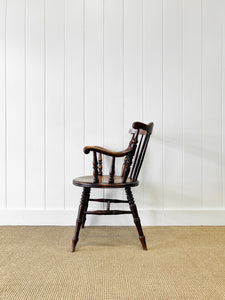 An Antique Penny-seat Stick Back Arm Chair