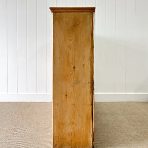 An Antique English Pine Pantry Cupboard