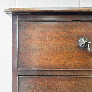 A English Georgian Chest of Drawers with Swan Neck Hardware