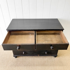 An Ebonized Antique English Chest of Drawers/Dresser