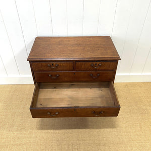 A English Georgian Chest of Drawers with Swan Neck Hardware