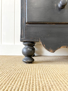 An Ebonized Antique English Pine Chest of Drawers or Dresser