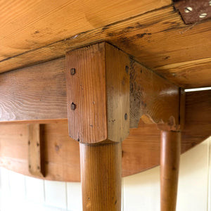 An Antique Irish Pine Oval Drop Leaf Kitchen Dining Table with Spoon Feet