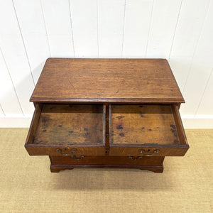 A English Georgian Chest of Drawers with Swan Neck Hardware