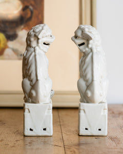 A Pair of Chinese Blanc de Chine Figures of Foo Dogs