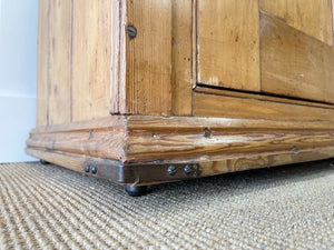 A Handsome English 19thc Pine Cupboard with Wooden Knobs