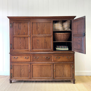 A Stately English 18th Century Oak Cupboard