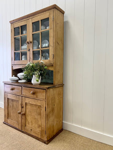 A 19th Century Pine Cupboard with Glazed Upper Doors