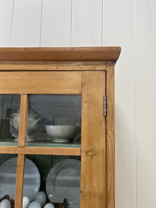 A 19th Century Pine Cupboard with Glazed Upper Doors