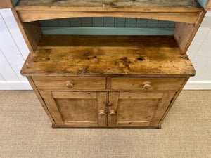 A 19th Century Pine Cupboard with Glazed Upper Doors