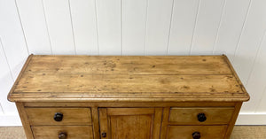 A Large and Low English Country 7 Drawer Pine Buffet or Sideboard c1860