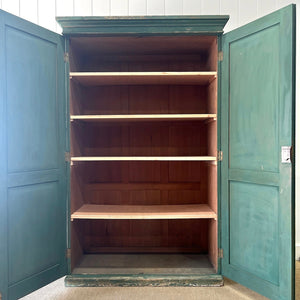 An English 19th Century Cupboard in Green Paint