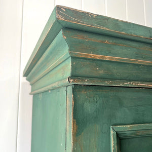 An English 19th Century Cupboard in Green Paint