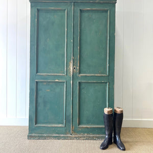 An English 19th Century Cupboard in Green Paint